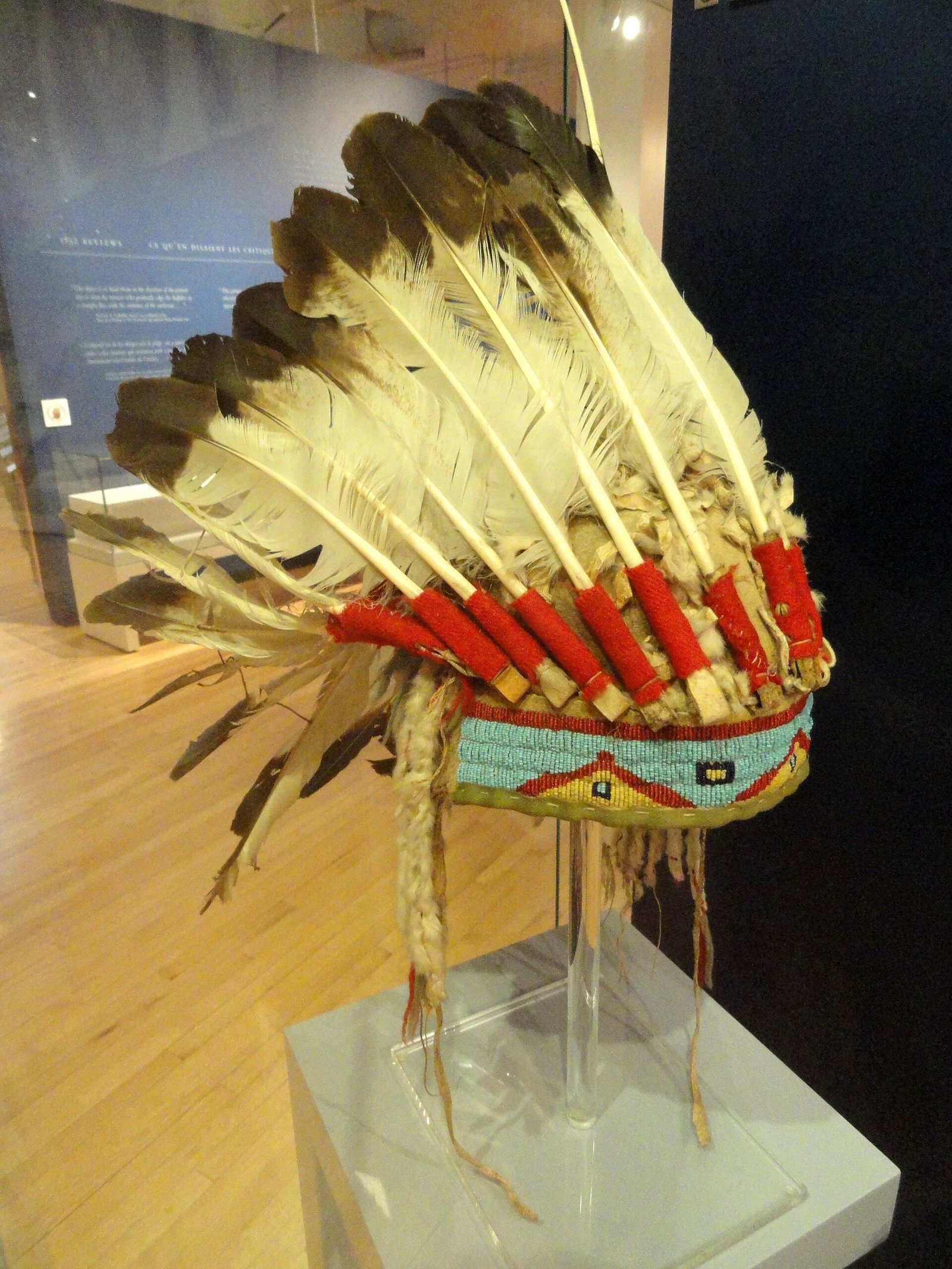 A war bonnet attributed to Sitting Bull, made of golden eagle tail feathers, weasel skins and beads, about 1875