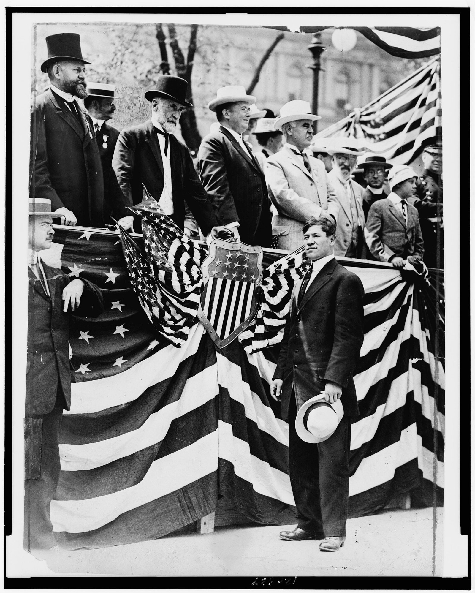 Jim Thorpe (front, holding his hat) is honored by New York Mayor William Gaynor and other officials at City Hall after t